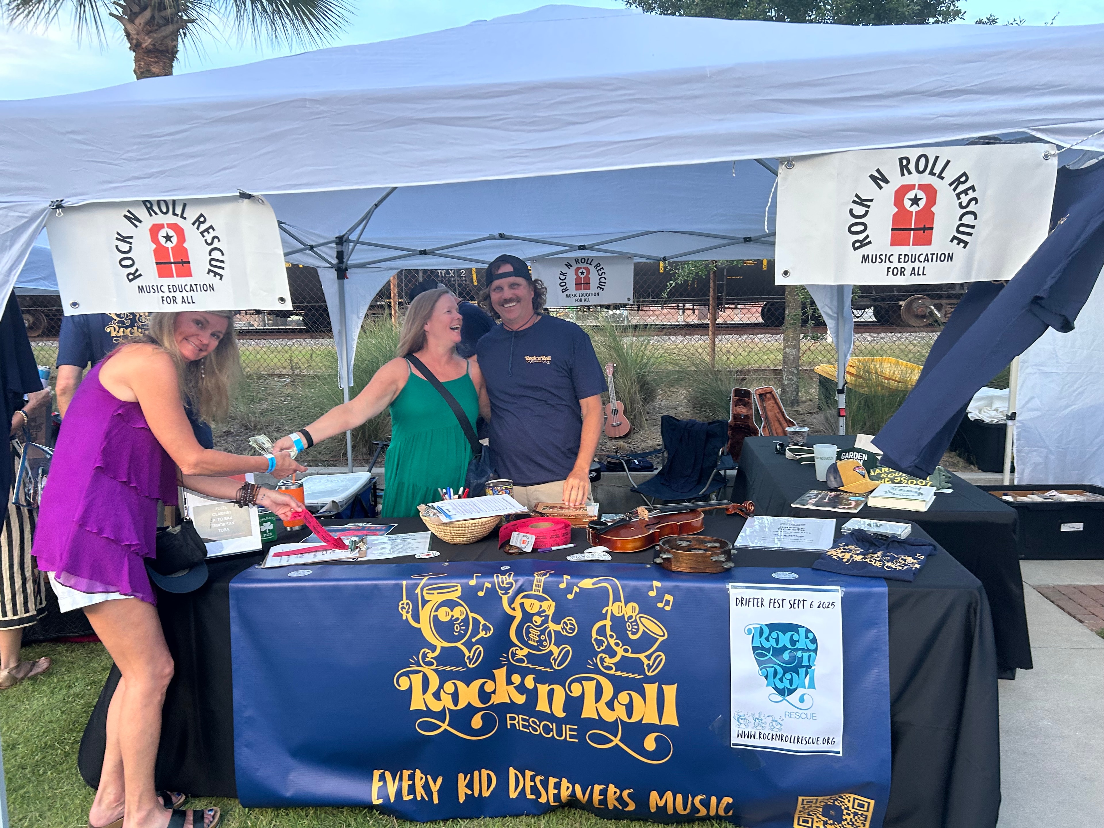 Rock N Roll Rescue donates instruments to Allegro Charter School of Music students
